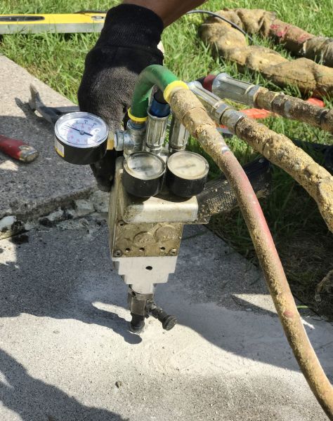 Concrete Sidewalk Lifting in Fairhope